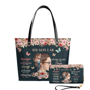 God Says leather tote bag and matching zip around wallet